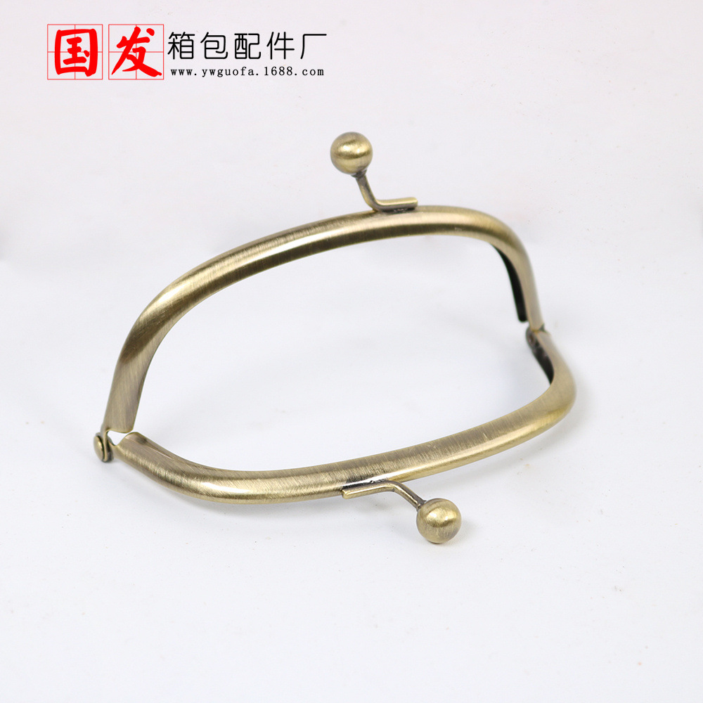 En stock: 12CM arco brillante sin agujeros hebilla de equipaje de bronce dorado accesorios de equipaje