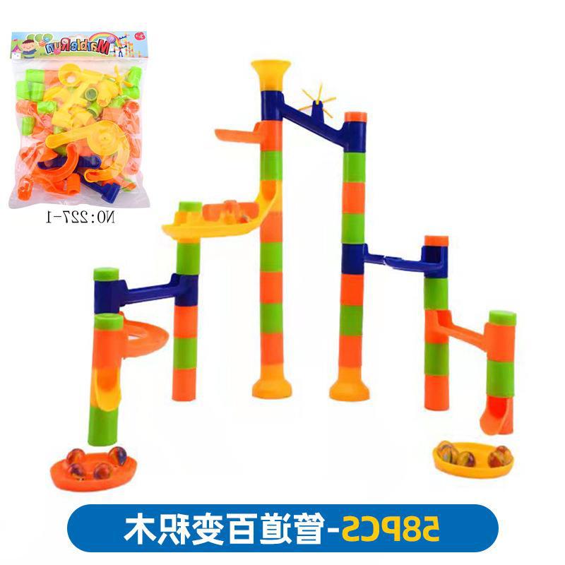 Bloques de construcción de los niños slide montado bola rodante cambiante bloques de construcción pequeña partícula juguetes niños y niñas parada parque al por mayor