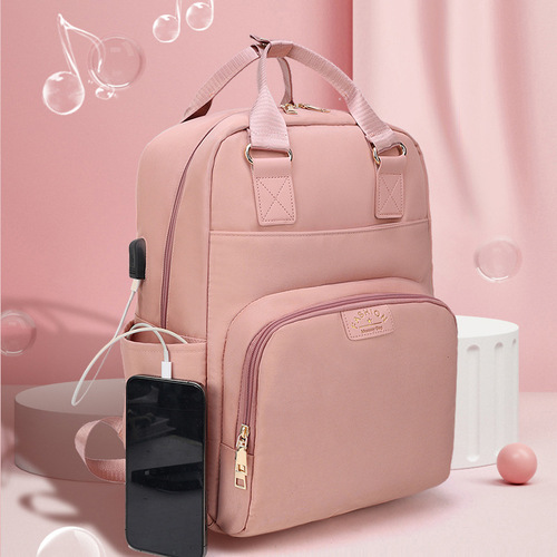 Spring Korean style mommy bag, simple and fashionable mother and baby bag with USB charging large capacity mommy bag multifunctional backpack