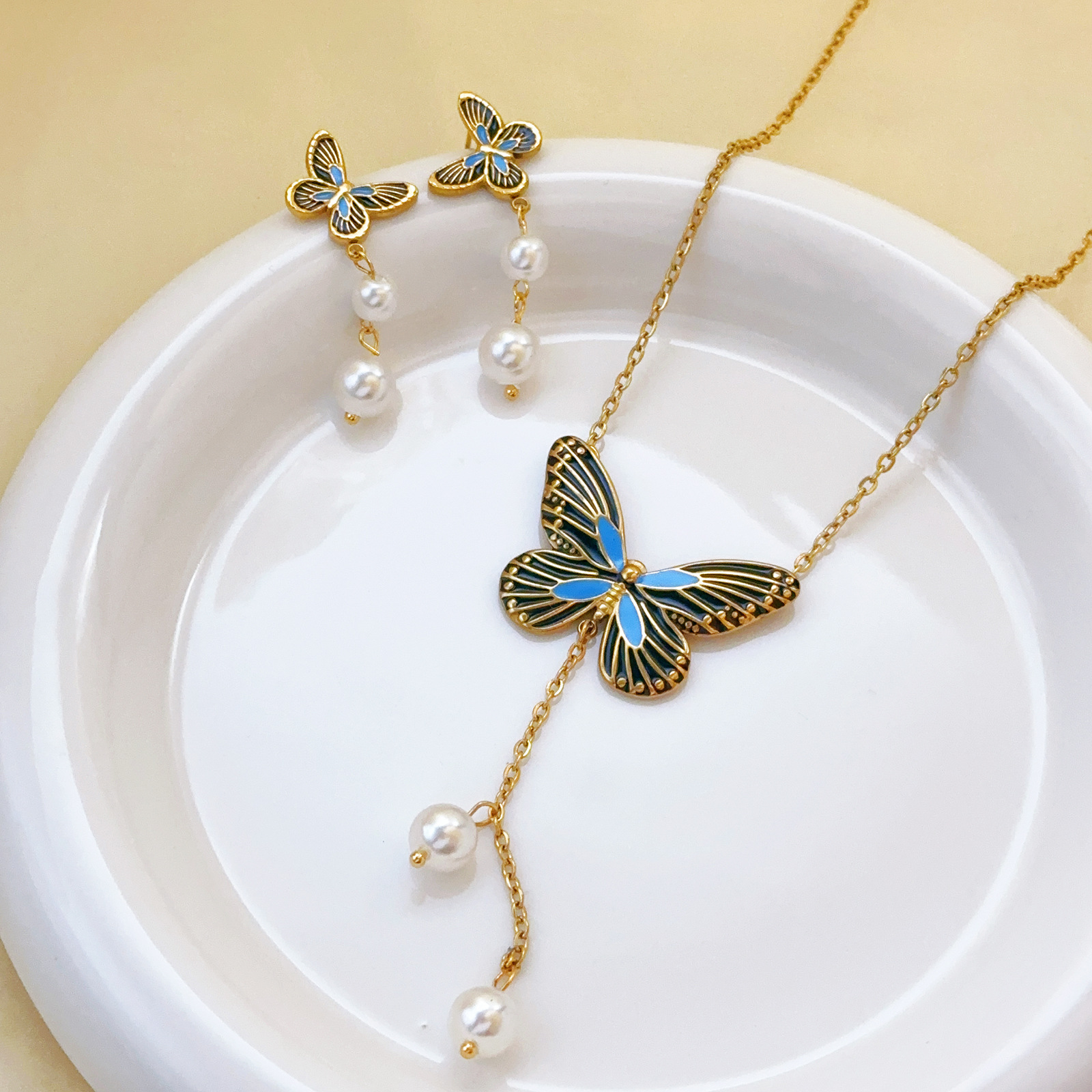 Nuevo estilo francés azul y oscuro, mariposa de titanio, perla de acero, collar de acero de titanio, joyería femenina, conjunto de temperamento, pulsera, pendientes image 1