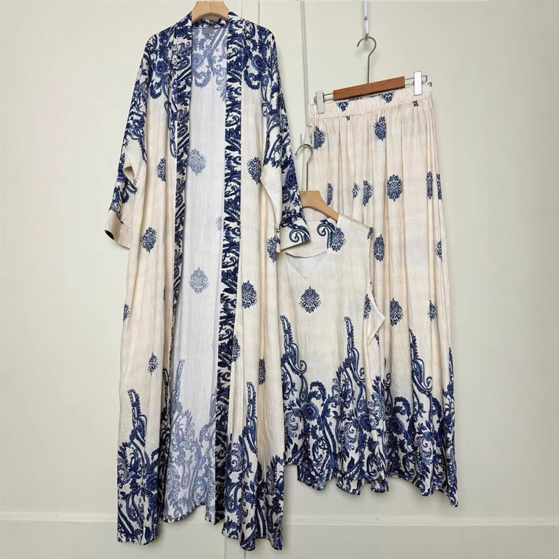 2025 foreign trade women's clothing retro positioning printing long cardigan vest three-piece loose pants skirt fashion suit