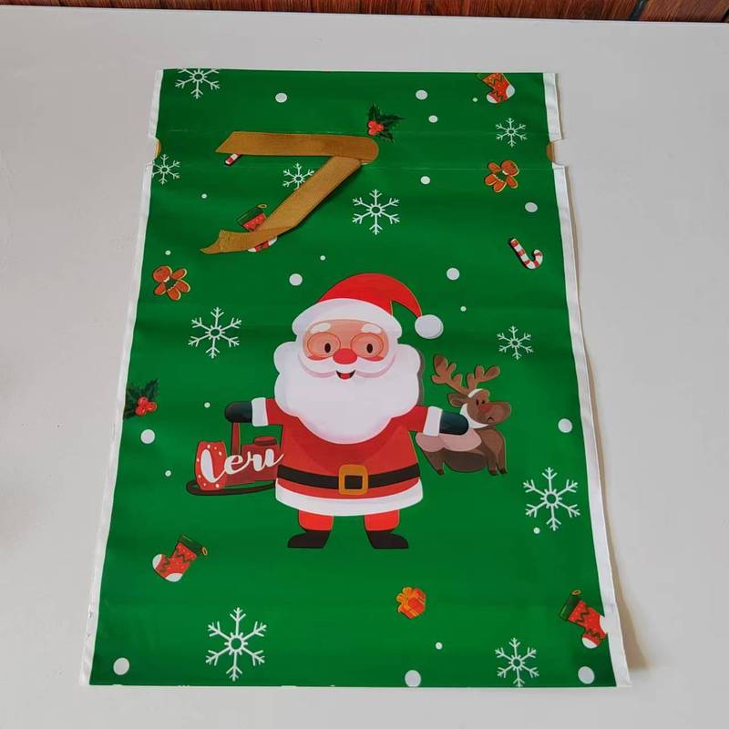 大型の新作越境ECクリスマスギフト包装袋、リボン付き巾着袋、キャンディバッグ、アップルバッグ、23cm*34cm|undefined