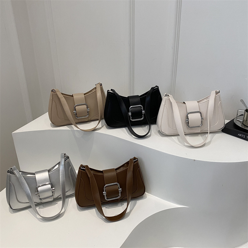 Temperamento simple y elegante bolso de hombro coreano para mujeres 2025, primavera nuevo bolso de brazo universal bolso de mujer coreano