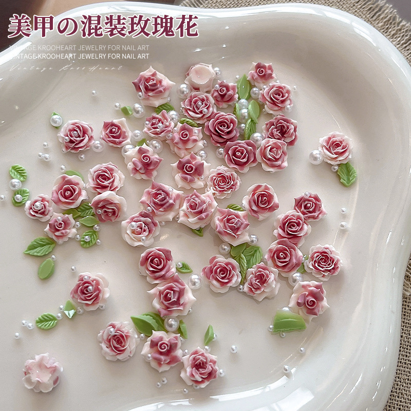 Advanced feeling rose nail art special jewelry three-dimensional exquisite camellia resin material bag nail decorations wholesale Advanced feeling rose nail art special jewelry three-dimensional exquisite camellia resin material bag nail decorations wholesale