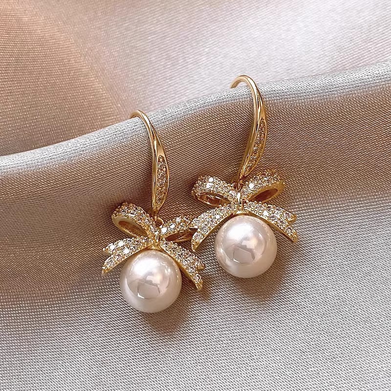 6 # Light luxury pearl bow earrings