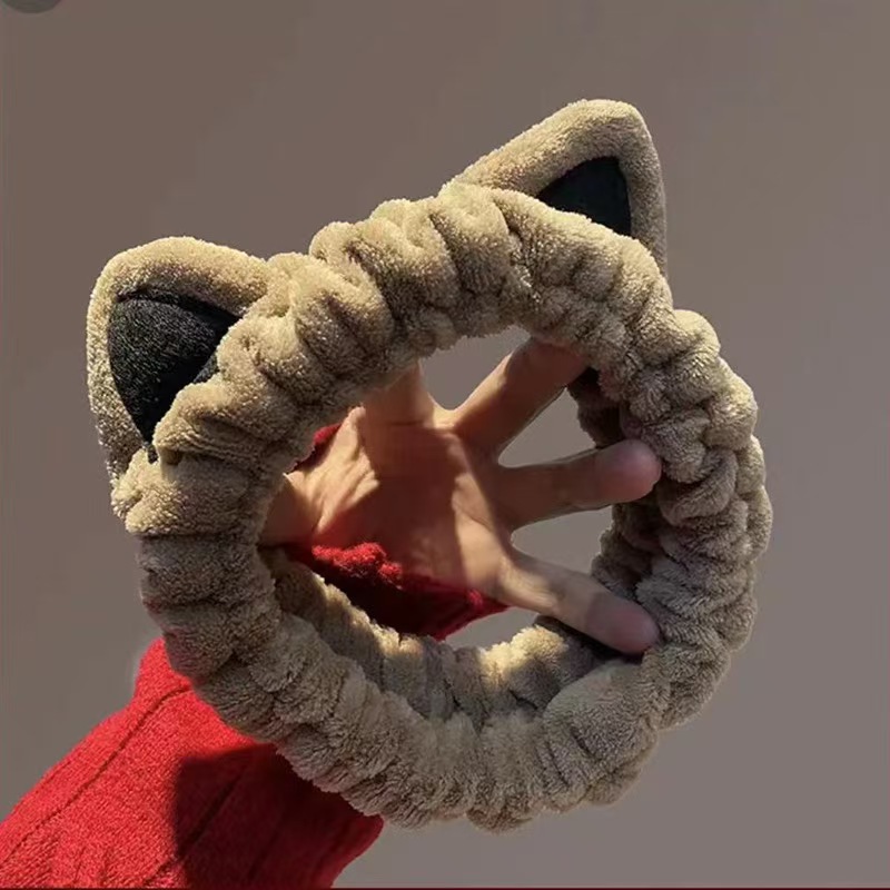 Otoño y invierno dibujos animados peluche lavar la cara cinturón de cabello máscara de mujer lavar la cara cinturón de cabello impermeable estereoscópico impermeable adornamientos de cabello al por mayor