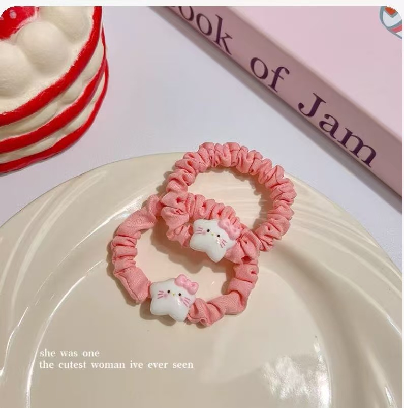 1 anillo de pelo rosa con estrella beige