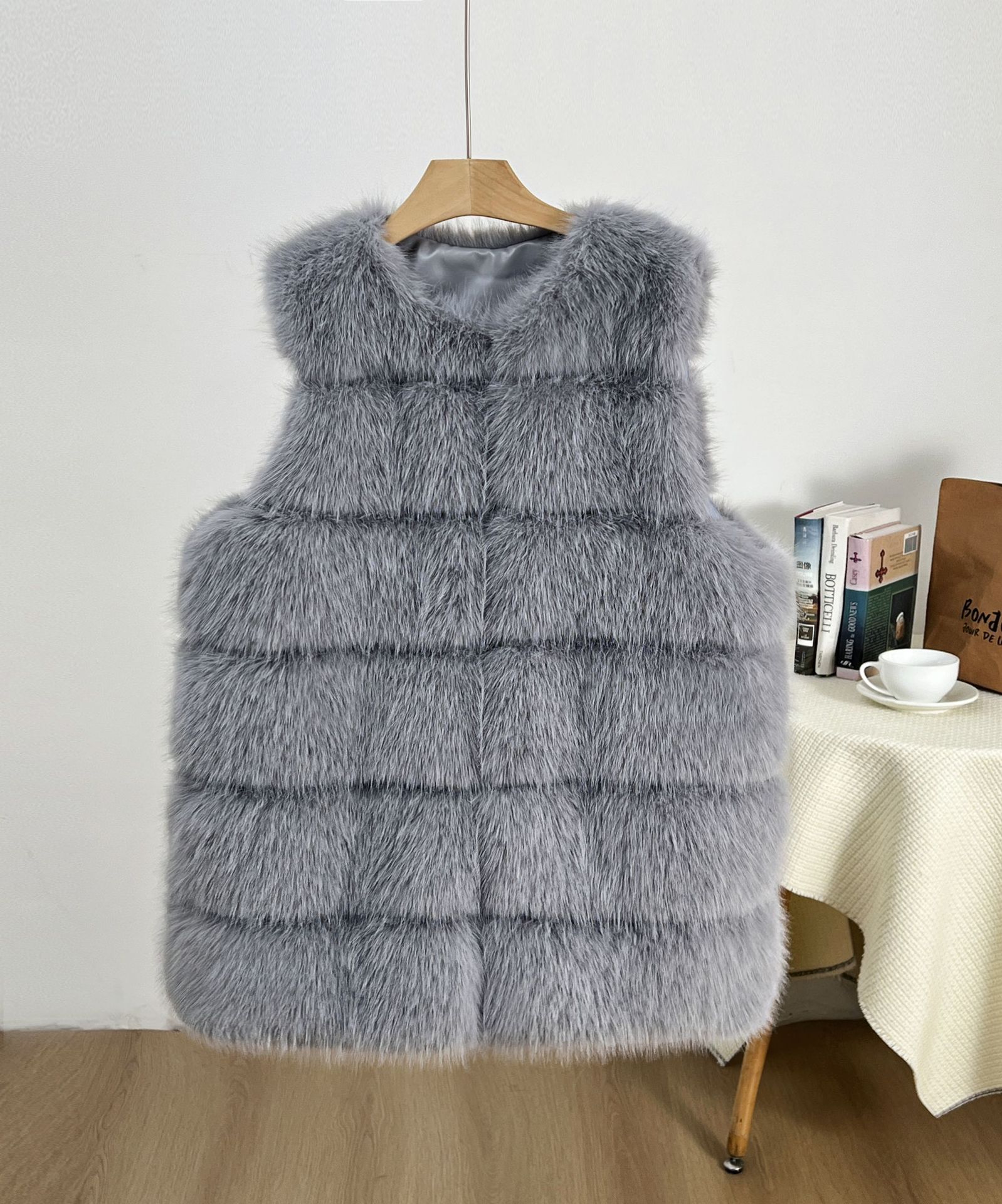 Clásico de seis puntas chaleco de conejo de pelo de zorro chaqueta larga al por mayor simple estilo exterior estilo