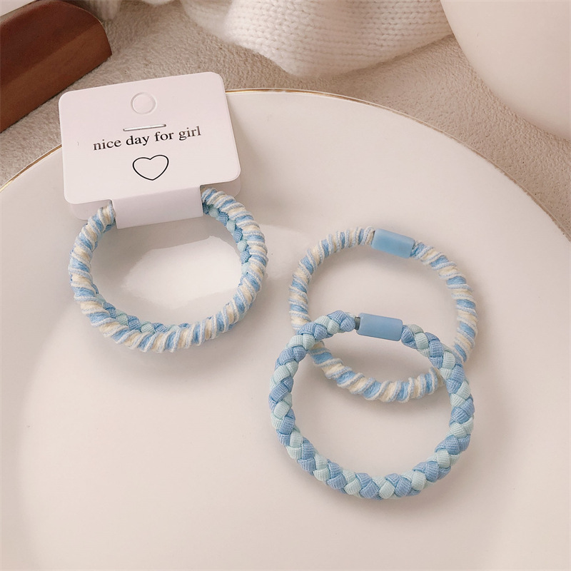 A principios de la primavera nueva cuerda de cabeza de color caramelo anillo de cabello coreano de niña de alta elasticidad universal cola de caballo cuerda de cabello adornamiento para el cabello