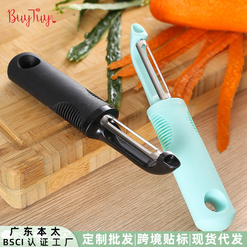 ゴムの快適な取っ手の皮むき器の瓜削り家庭は多く皮むきの果物の野菜を使って皮むきの台所の道具を使います。|undefined