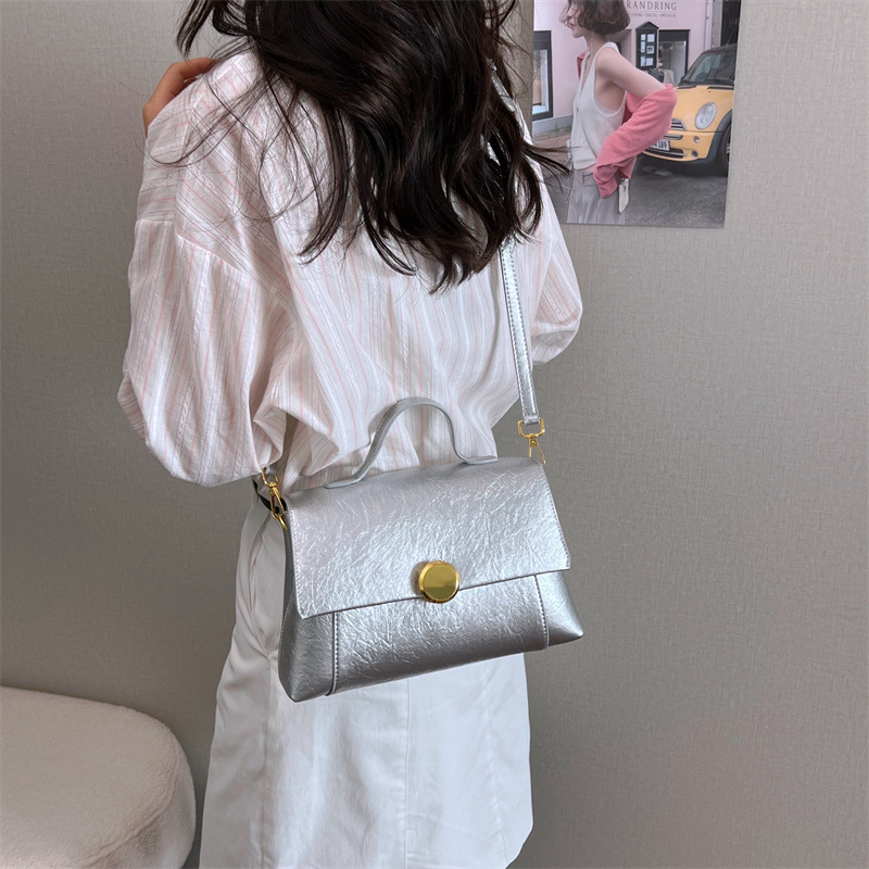 Bolso de moda casual personalizado bolso de tendencia simple diaria 2026 nuevo retro versátil mochila de hombro