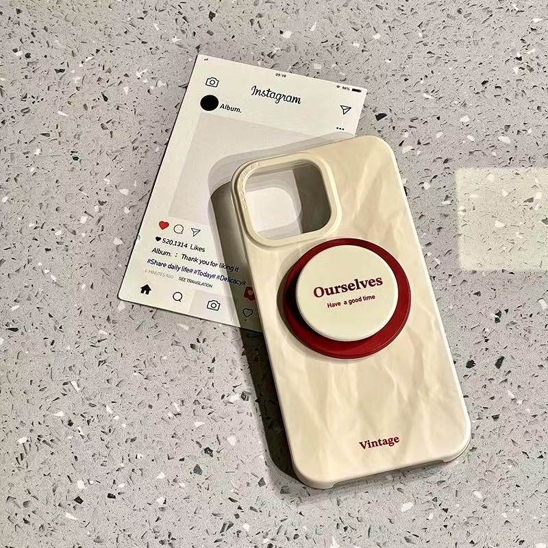 Soporte magnético plisado inglés simple para iPhone16ProMax funda para teléfono móvil 14 Apple 15 pareja 13 nuevo