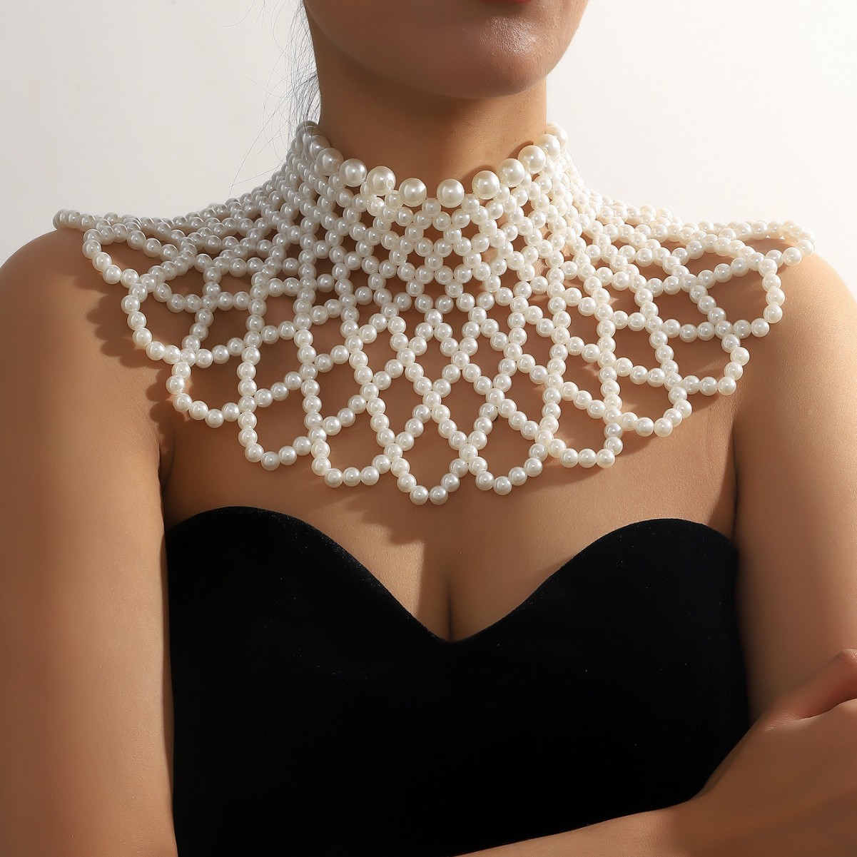 Joyería transfronteriza europea y americana venta caliente verano bohemio cadena de cuerpo señoras cadena de pecho de perla de imitación tejida a mano
