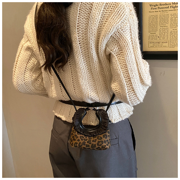 Moda coreana con patrón de leopardo para niñas bolsos de encaje exquisitos mini bolsos de hombro para bebés bolsos de comercio exterior transfronterizos para niños
