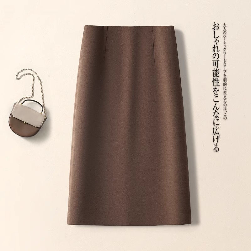 カレー色のa字の半身のスカートの女性の秋のハイウエストはやせているストレートのスーツのスカートの高級感の包みのお尻の中の長いタイプのオープンスカートを現します。|undefined