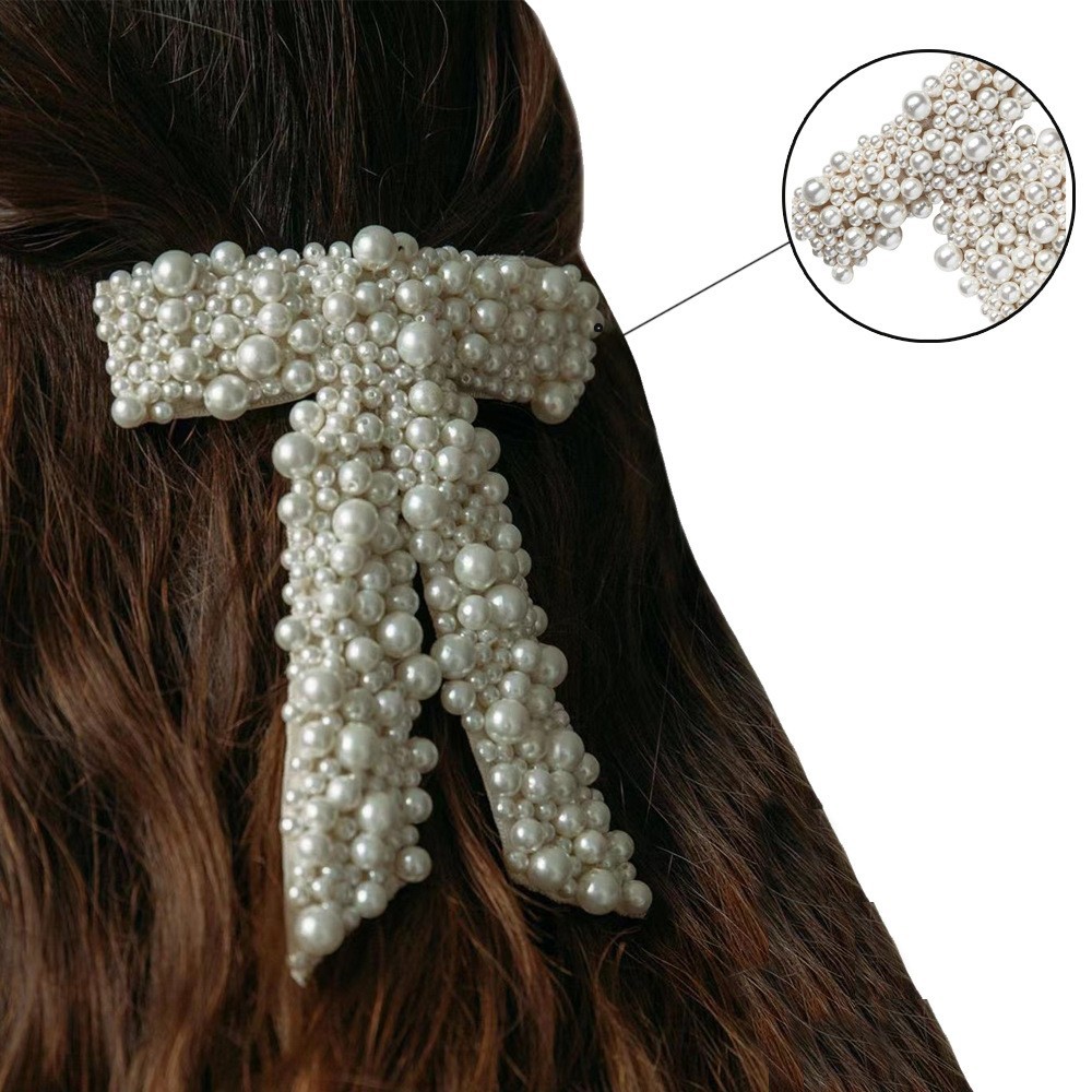 Fábrica de perlas transfronterizas venta directa al por mayor Europeos y Estados Unidos tocadillos retró tocadillos de cabello lujoso ligero tocadillos de cabello banda de baile