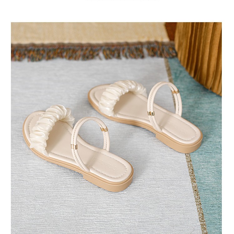 Coreano con una sola sandalias con dos zapatillas de verano para mujeres 2025 nuevos zapatos de playa de suela suave de mamá simple