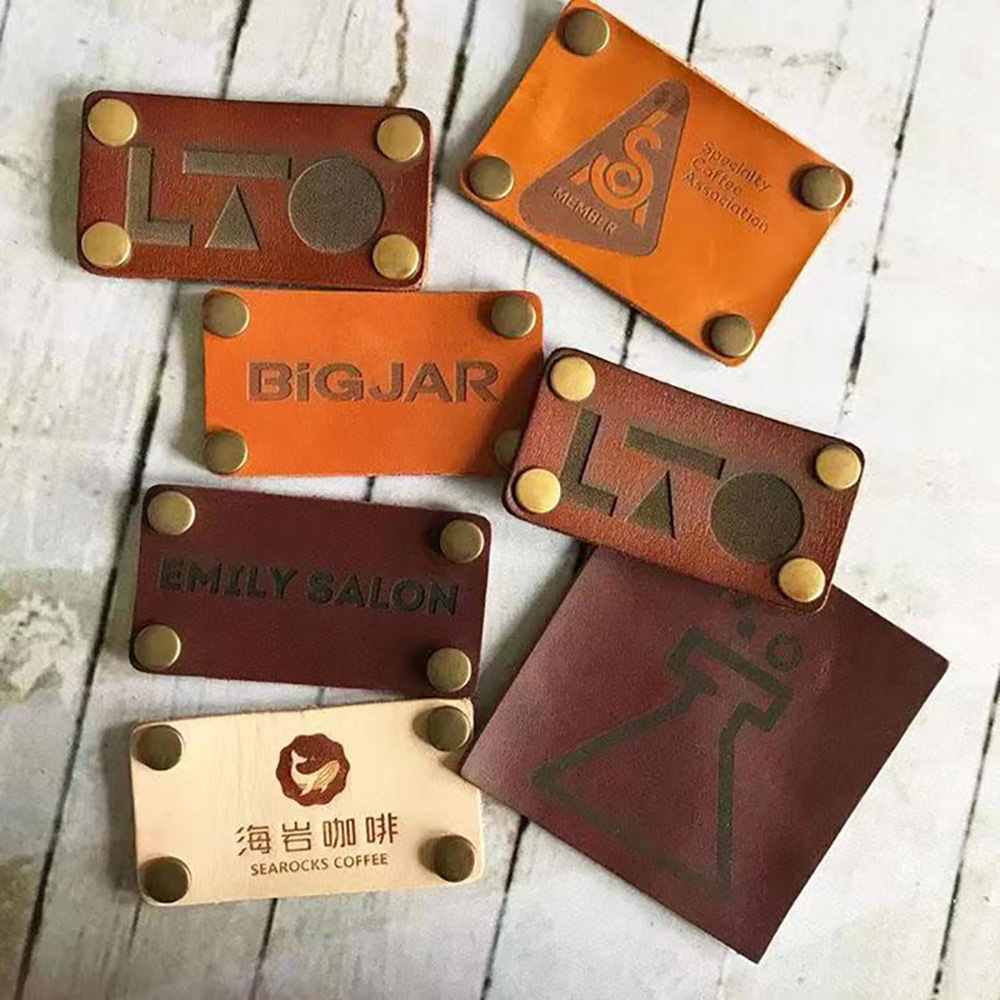 围裙包包工作服皮标LOGO镭射/铜模压印/空白皮标/皮条装饰定 制