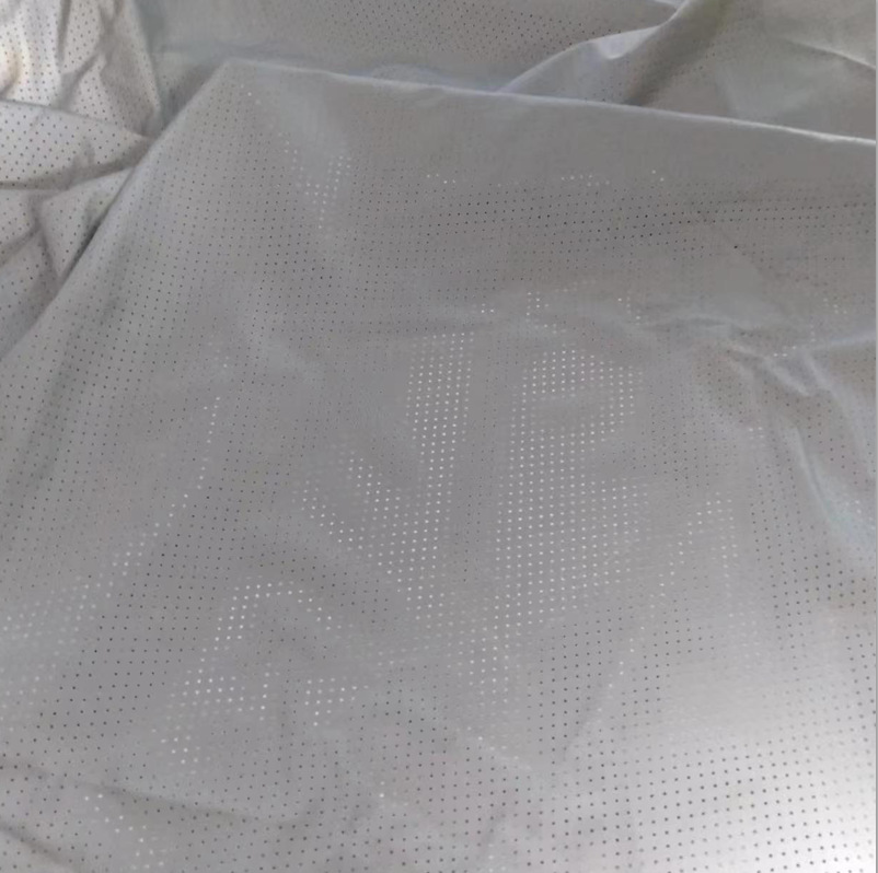 厂家现货批发镂空透气打孔反光弹力布高亮银灰色化纤冲孔反光布