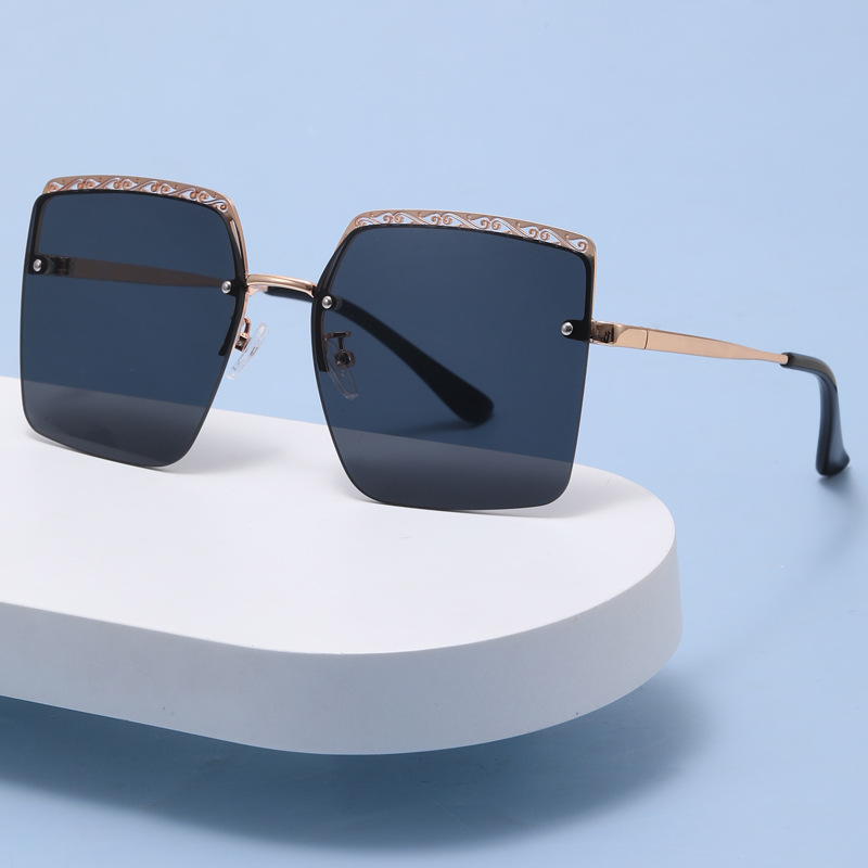 Primavera de fábrica nueva Europa y América transfronteriza Sun Festival frameless recort-out metal gafas de sol personalizadas