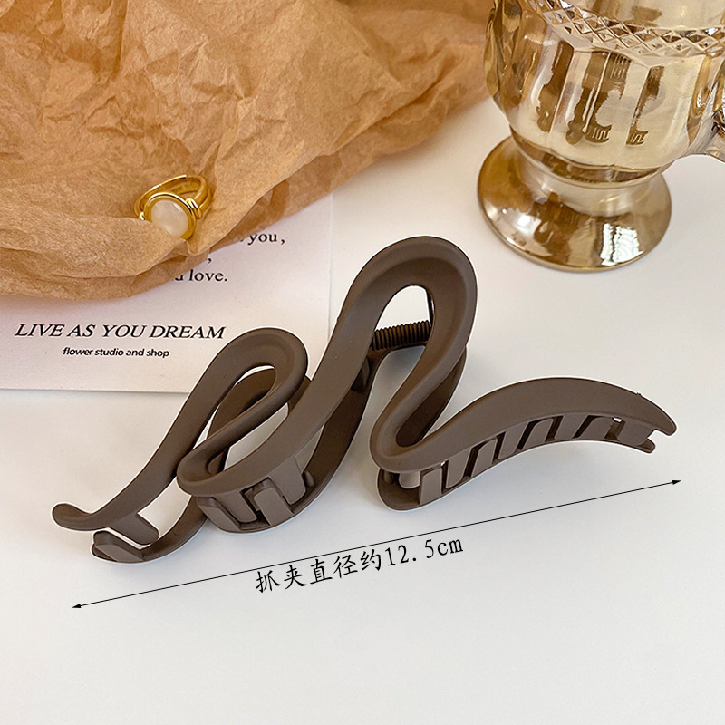 Snake-shaped dark brown 13cm