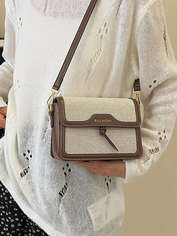 Bolsos de lujo ligero de alta calidad para mujeres 2026 comercio exterior nuevo lienzo retro empalme multi-bolsillo multicapa bolso de mochila
