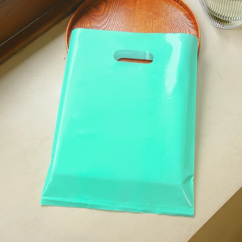 Bolsa de mano de tienda de ropa de grosor, bolsa de embalaje de ropa para niños y niñas, bolsa de almacenamiento de cosméticos, bolsa de regalo, bolsa de embalaje comercial