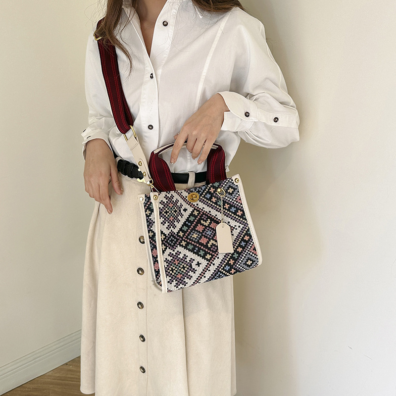 Gran capacidad lona Plaid Portátil Bolsa femenina 2024 transfronteriza primavera nuevo trabajo viajero hombro bolsa de mensajero