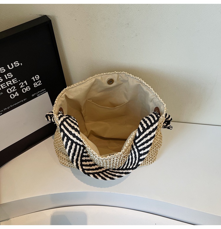 Summer large-capacity straw woven bag for women, 2025 new style seaside and beach vacation single-shoulder bag, commuter tote bucket bag undefined