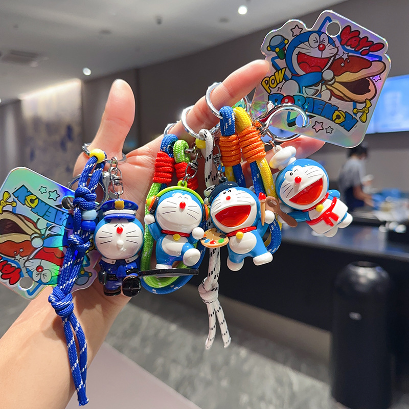 2025 New Product Cartoon Exquisite Anti-Dirty Genuine Doraemon Police Doll Keychain Female Cute Car Pendant