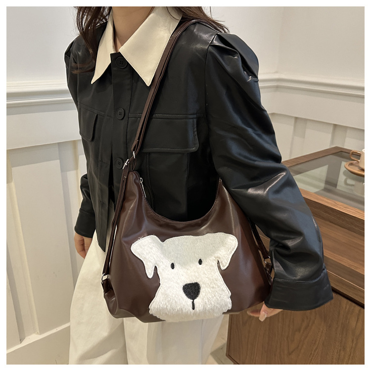 The new autumn and winter 2024 fashion cartoon backpack with simple, individual and niche design, single-shoulder bag and commuter tote bag undefined