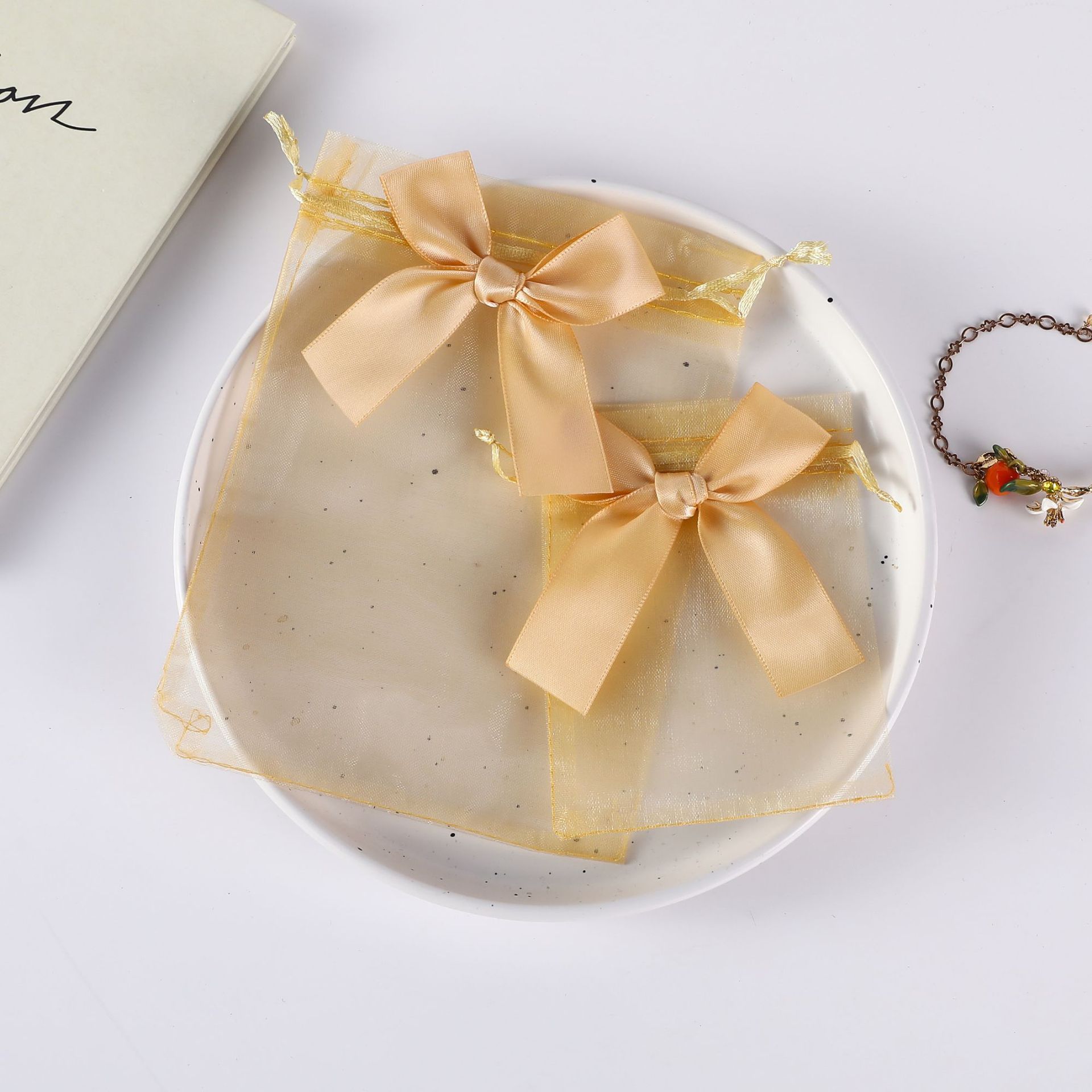 Bolso de gasa con lazo dorado transfronterizo, bolsa de dulces de boda, bolsa de regalo para fiesta, bolsa de embalaje de regalo, bolsillo con cordón