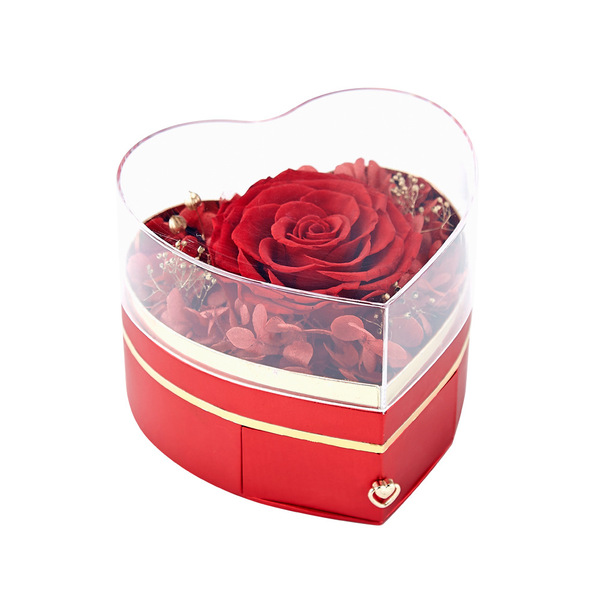 Acrylic ring heart shaped contains rose