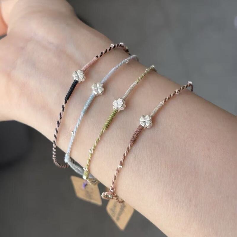 Spring, Summer, Autumn and Winter New Explosions Four-leaf Clover Hand Rope Lucky Bracelet Couple's Best Friend Simple All-match Niche Gift