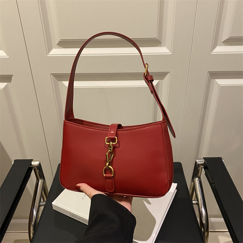 Textura de la bolsa de hombro de la mujer de la primavera de 2025 nueva bolsa de mochila en el temperamento elegante bolso cuadrado