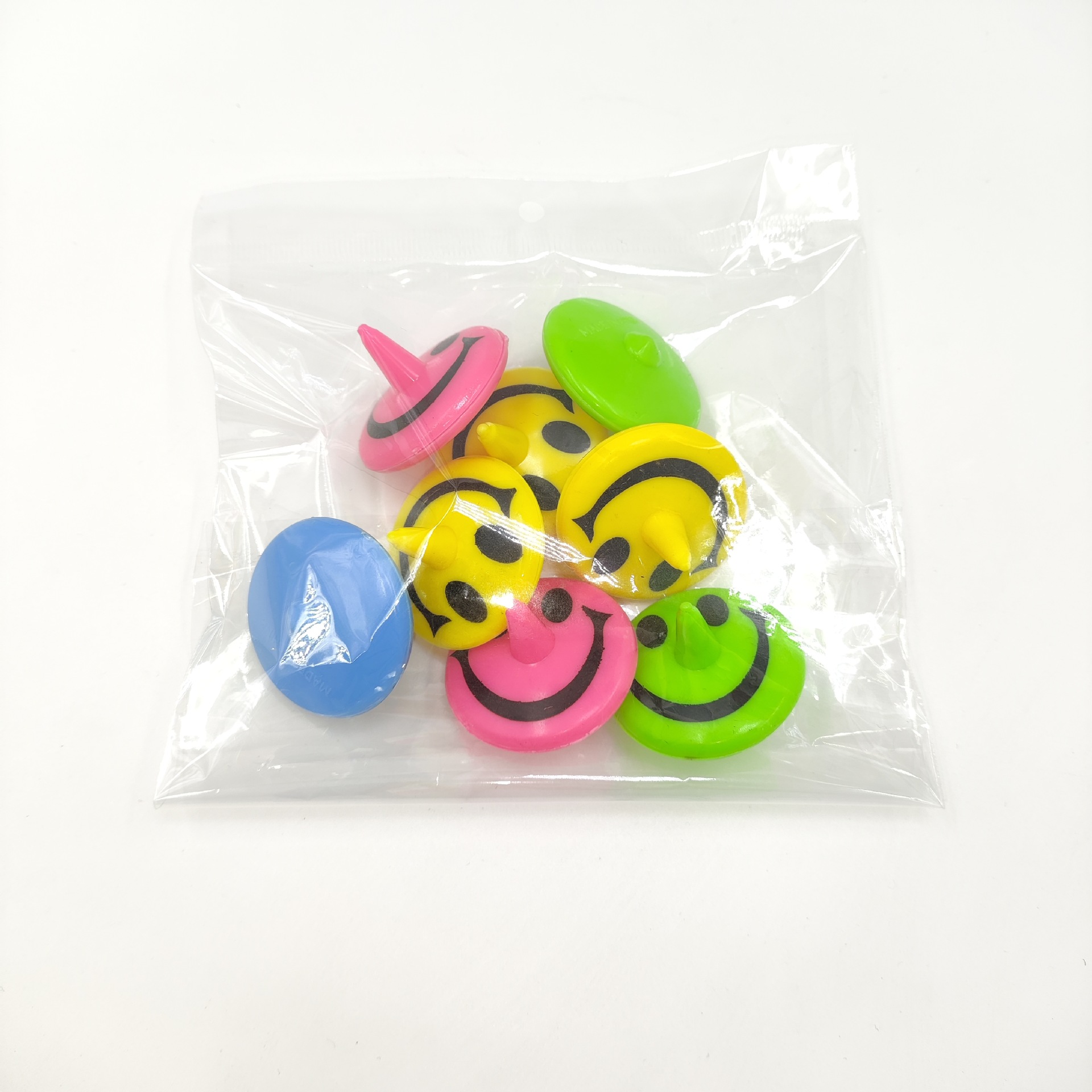 Sonriente juguetes giroscópicos tarjetas de succión conjunto de accesorios de encaje giroscópicos mano girar niños pequeños juguetes de lucha al por mayor