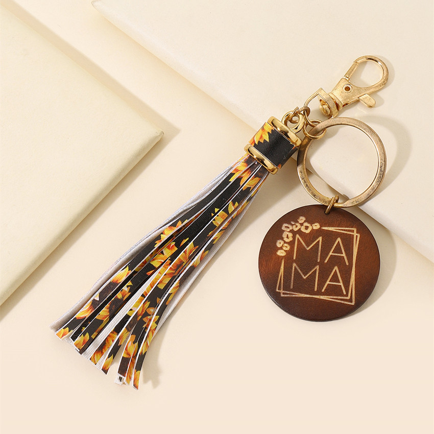 17g Weight Keychain Classification 1 Piece Quantity Casual, Holiday, Daily Occasion Pu Leather Material Mother'S Day Festival Letter, Tassel Pattern Unisex Gender Modern Style Style Modern Style Letter Tassel Pu Leather Mother'S Day Unisex Keychain 28