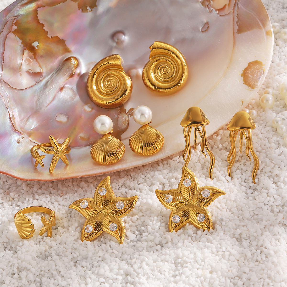 Orecchini a forma di stella marina e conchiglia con perla_voghion.com