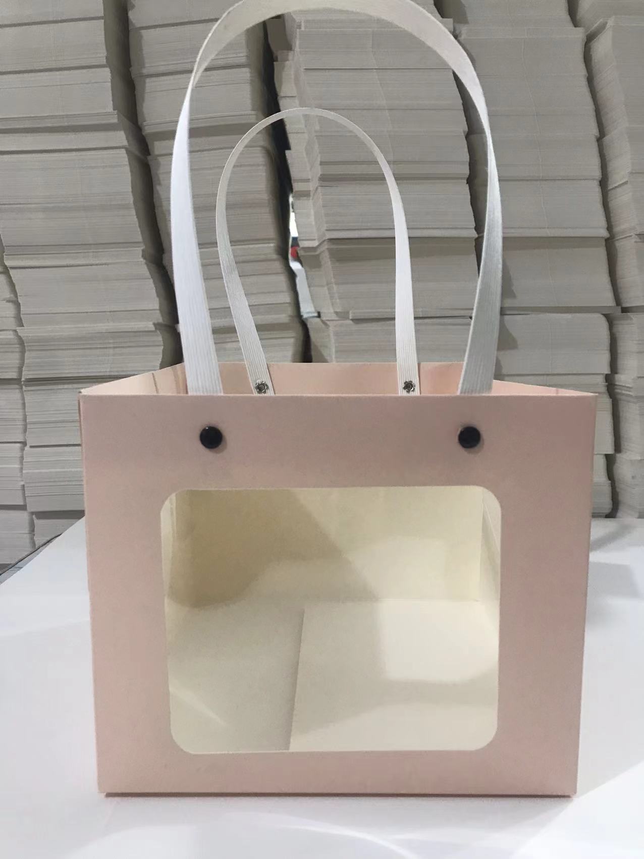 Bolso de mano con remache sonriente con ventana abierta transparente, caja de regalo de embalaje de vacaciones, joyería de juguete exquisita, bolsa de embalaje de plantas verdes al por mayor