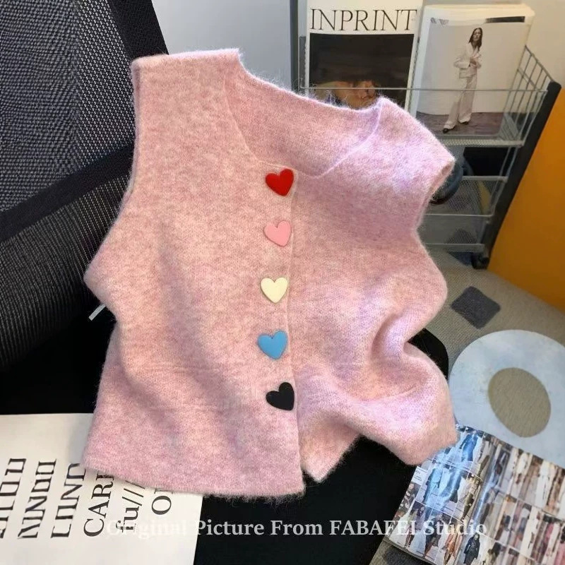 Heart-shaped button sweater vest, Korean style, 26 spring new fashion, stylish, sweet, age-reducing, sleeveless vest for women Heart-shaped button sweater vest, Korean style, 26 spring new fashion, stylish, sweet, age-reducing, sleeveless vest for women