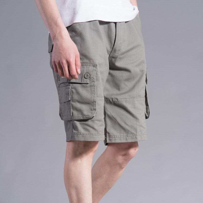 2021 verano TikTok nuevos pantalones cortos de ropa de trabajo pantalones de playa para hombres pantalones cortos multibolsillos sueltos de color sólido comercio exterior