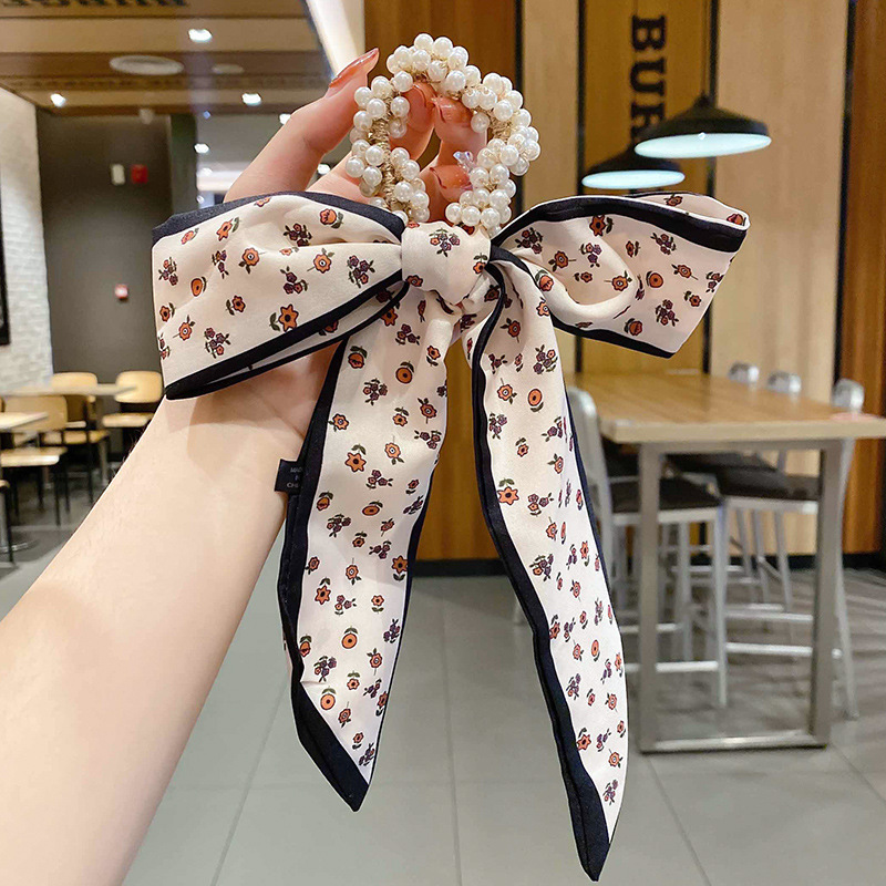 Banda de pelo de bufanda de seda corbata de pelo femenina Shixi Cinta de lazo de perla sale todo partido cuerda de cabeza Shixi 2021 cabello nuevo