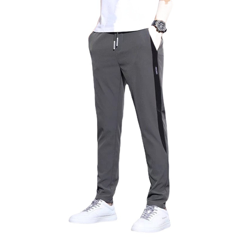 Pantalones casuales de verano para hombres nuevos Pantalones rectos de seda de hielo delgada elástica de cuatro lados pantalones ligeros de negocios pantalones delgados Coreanos