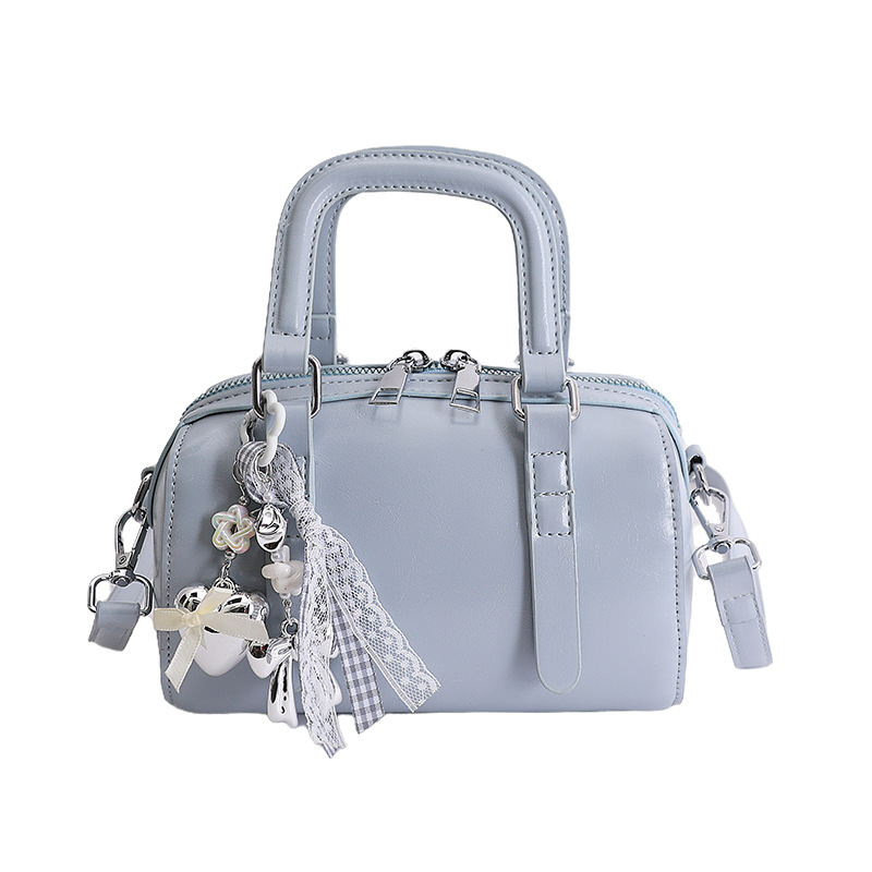 Verano nuevo bolso de almohada portátil para mujeres 2026 nueva moda alta sensación casual versátil mochila de hombro