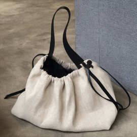 帆布斜跨女大包2025ins拼接撞色抽绳麻料手提单肩旅行包大容量