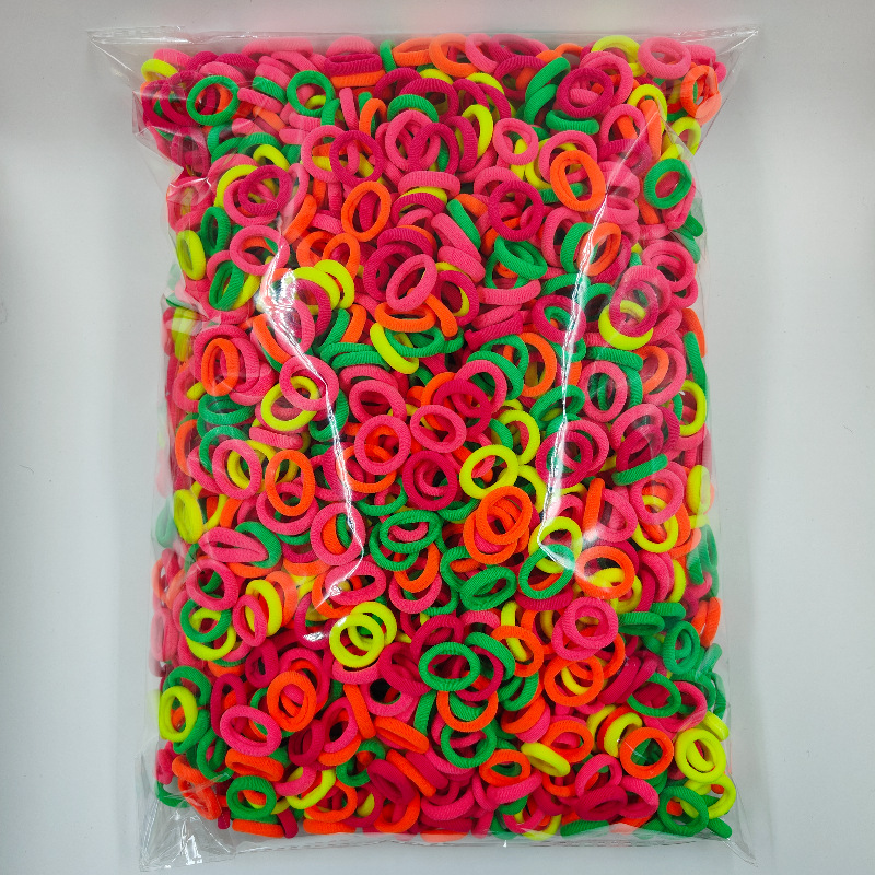 Fábrica directa sin costuras de alta elasticidad cuerda de cabeza para niños anillo de toallas OPP2000 anillo de cabello de cabello para bebés al por mayor