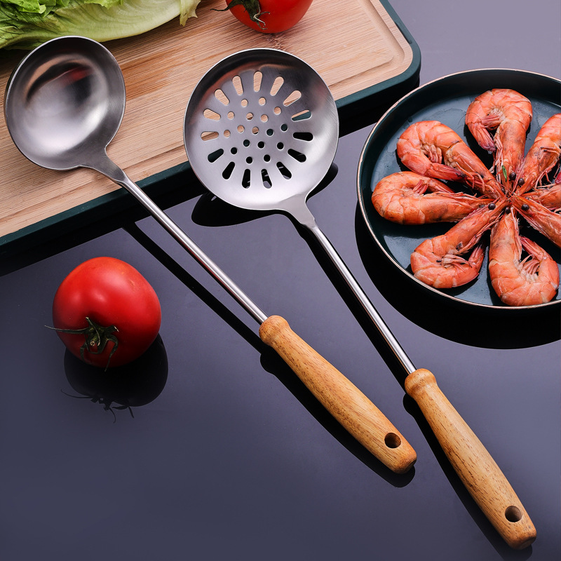 304 de acero inoxidable espátula cocina del hogar mango de madera cocina pala de sopa cuchara freír pala utensilios de cocina traje de fábrica al por mayor