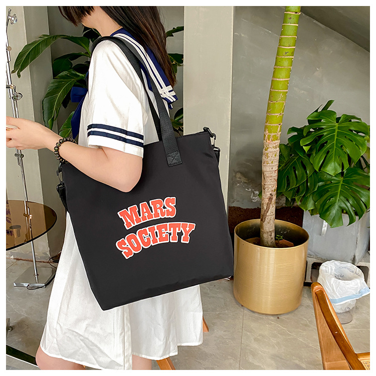Canvas bag for women, single shoulder, ins crossbody, laid-back style, college student class bag, artistic Japanese style, large capacity, Hong Kong style, chic undefined