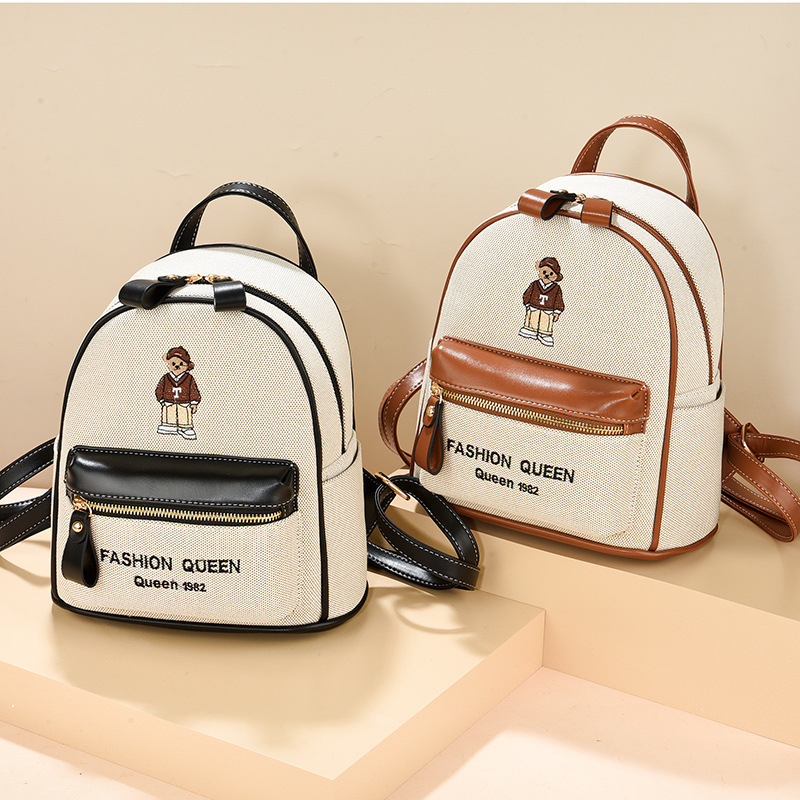 Mochila mujer 2025 nuevo estilo estudiante universitaria moda bordado mochila de viaje mochila de gran capacidad de doble uso