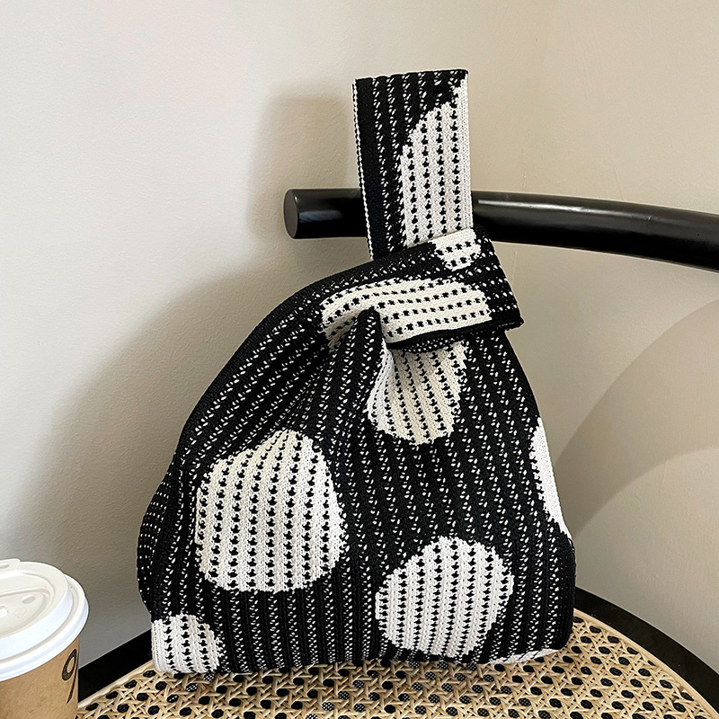 Estilo coreano nicho diseño moda hueco pequeña flor de punto bolso de mano estudiante de gran capacidad bolso de las axilas bolso de las mujeres